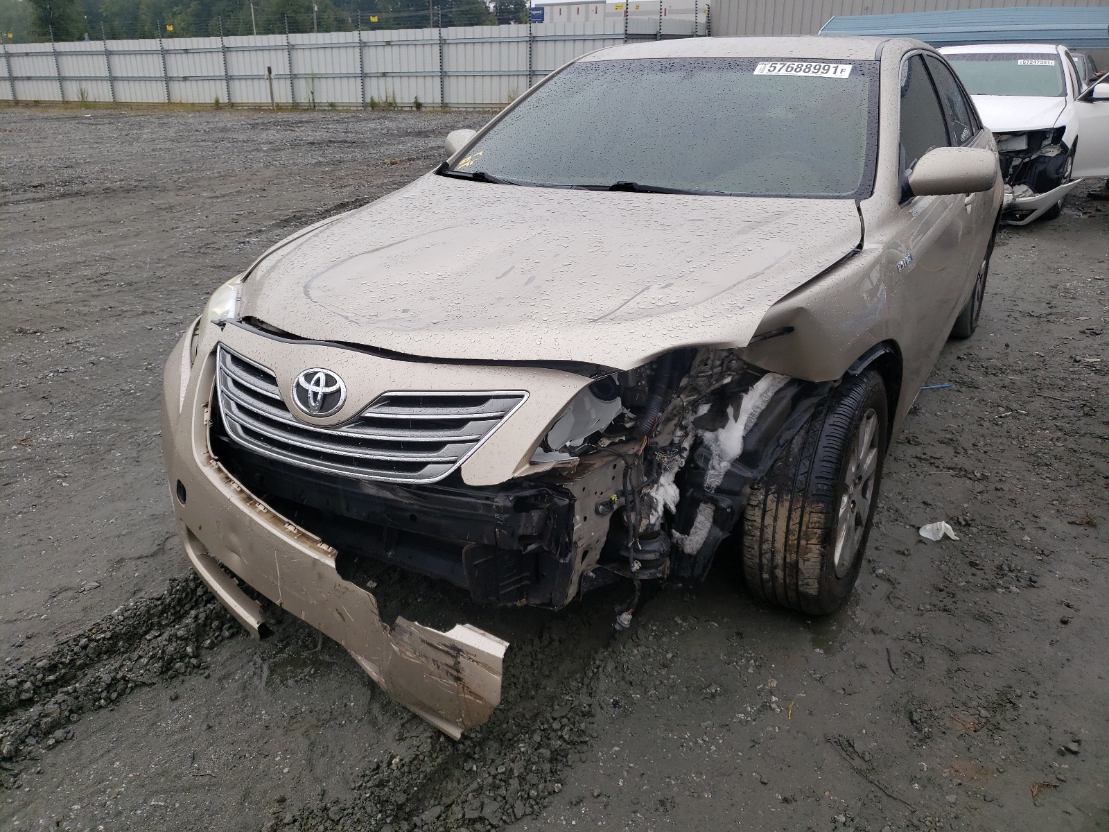 Photo 2 from auction – 2007 TOYOTA CAMRY HYBR with VIN JTNBB46K673020342
