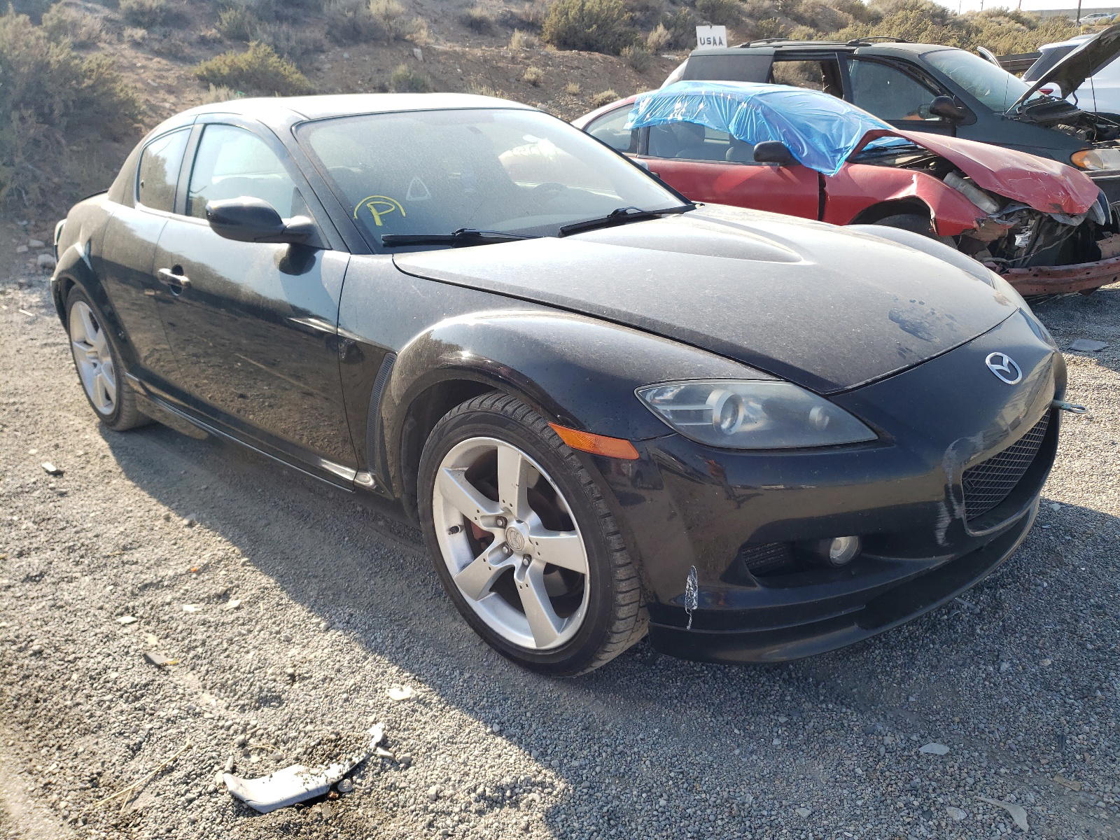 MAZDA RX8 2004 with VIN JM1FE173140120428 - Photo from auction