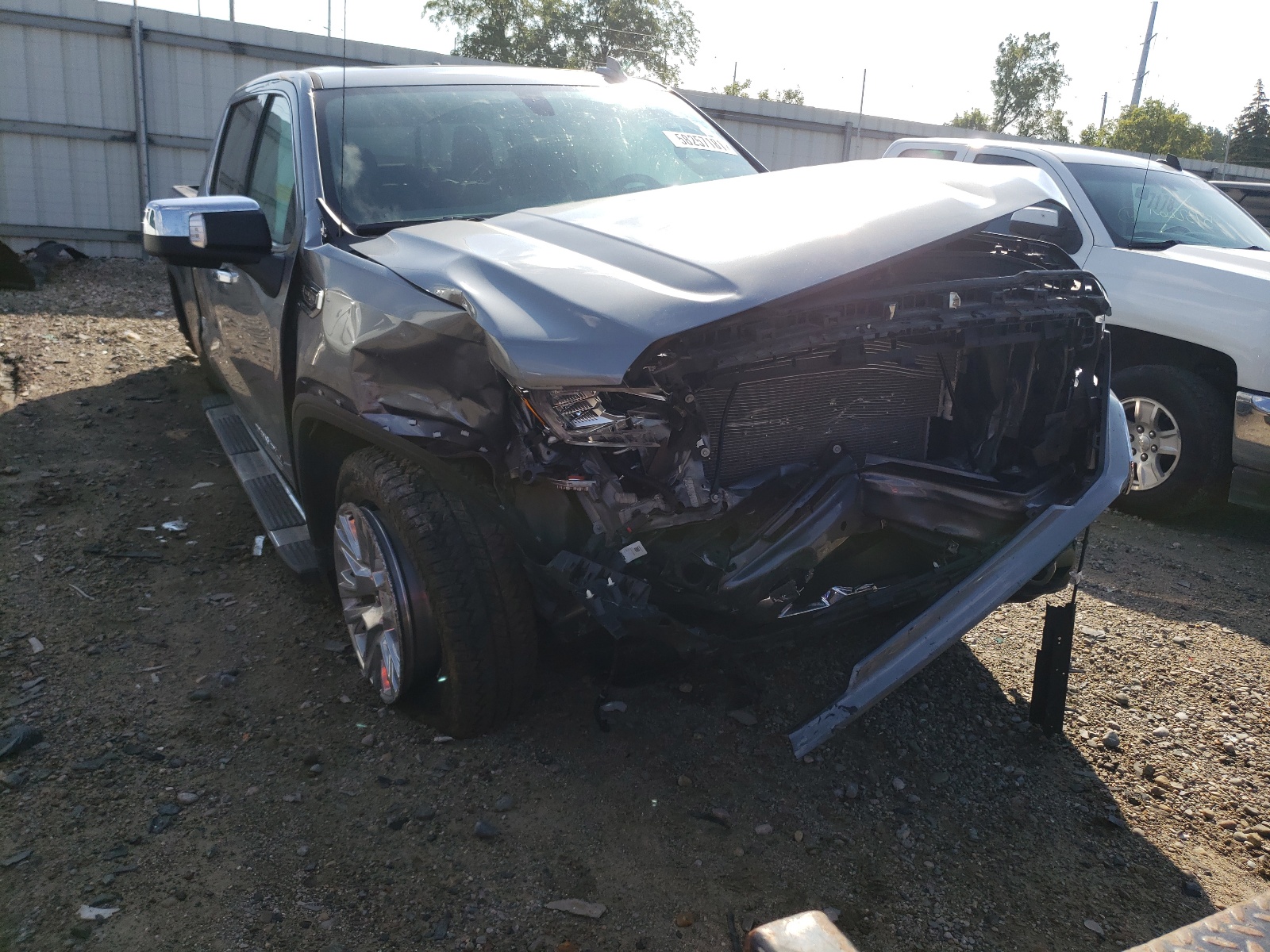 Photo 9 from auction – 2021 GMC SIERRA K15 with VIN 3GTU9FED2MG212549