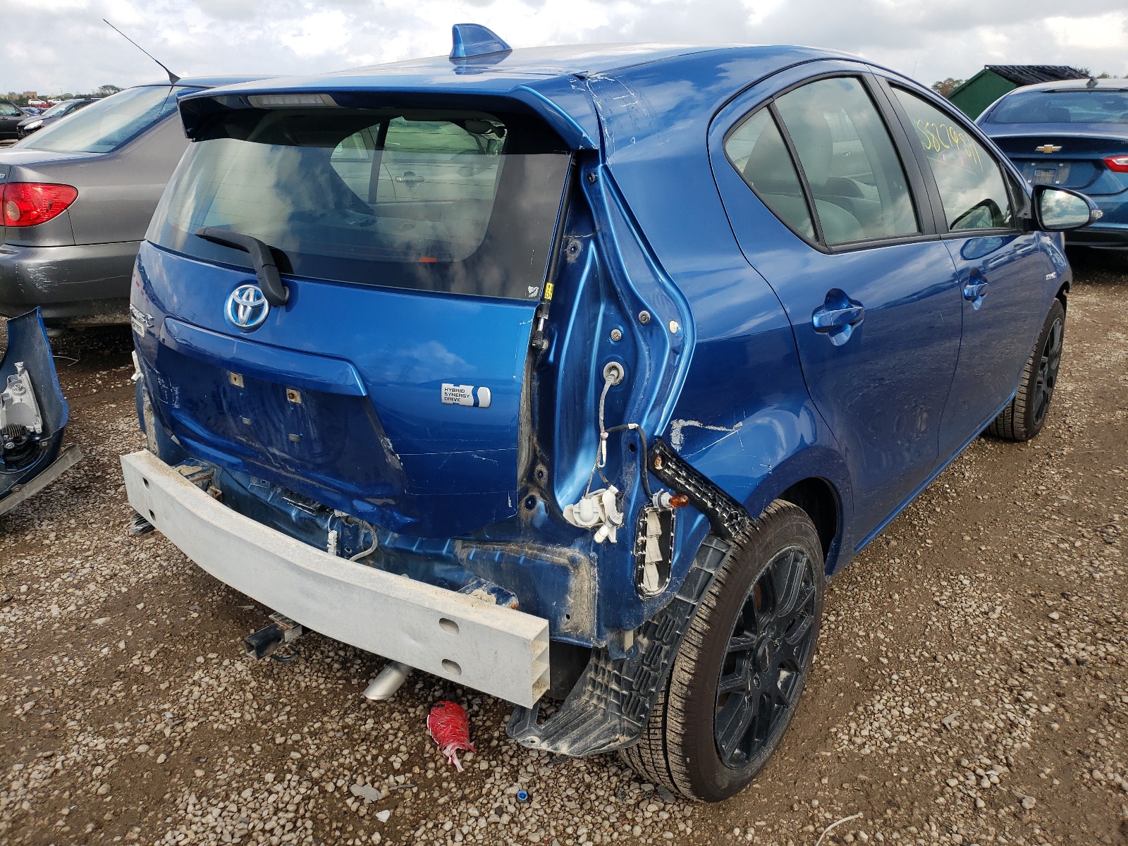 Photo 4 from auction – 2015 TOYOTA PRIUS C with VIN JTDKDTB30F1109681