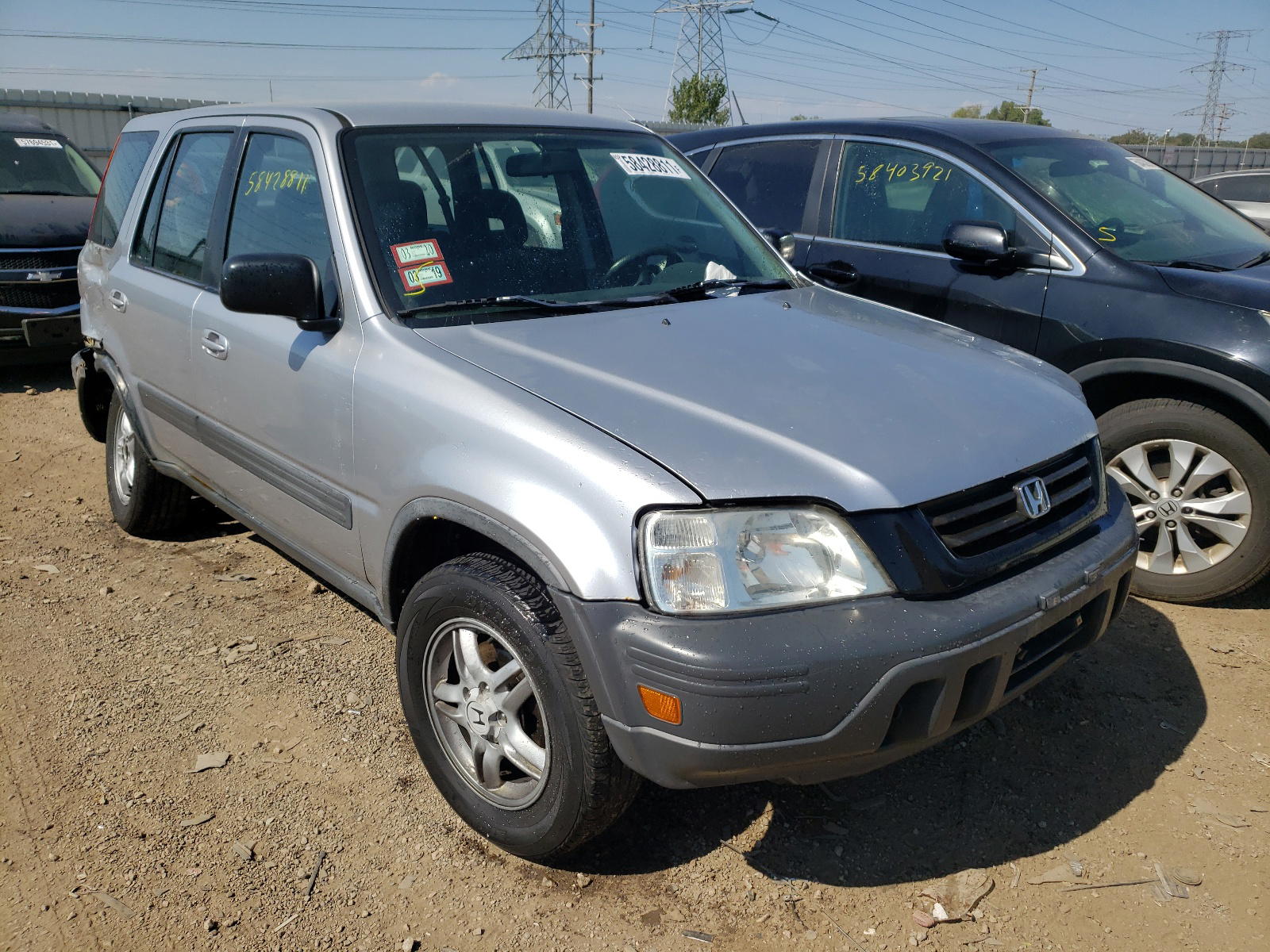 HONDA CRV 2001 with VIN JHLRD18681S028129 - Photo from auction