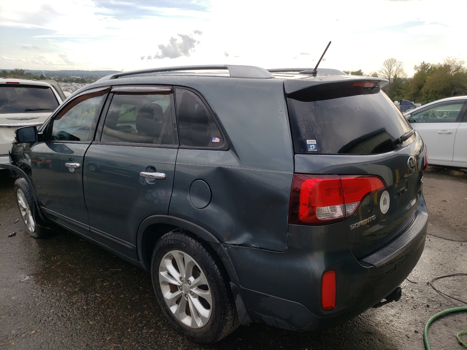 Photo 3 from auction – 2014 KIA SORENTO EX with VIN 5XYKU4A72EG437046
