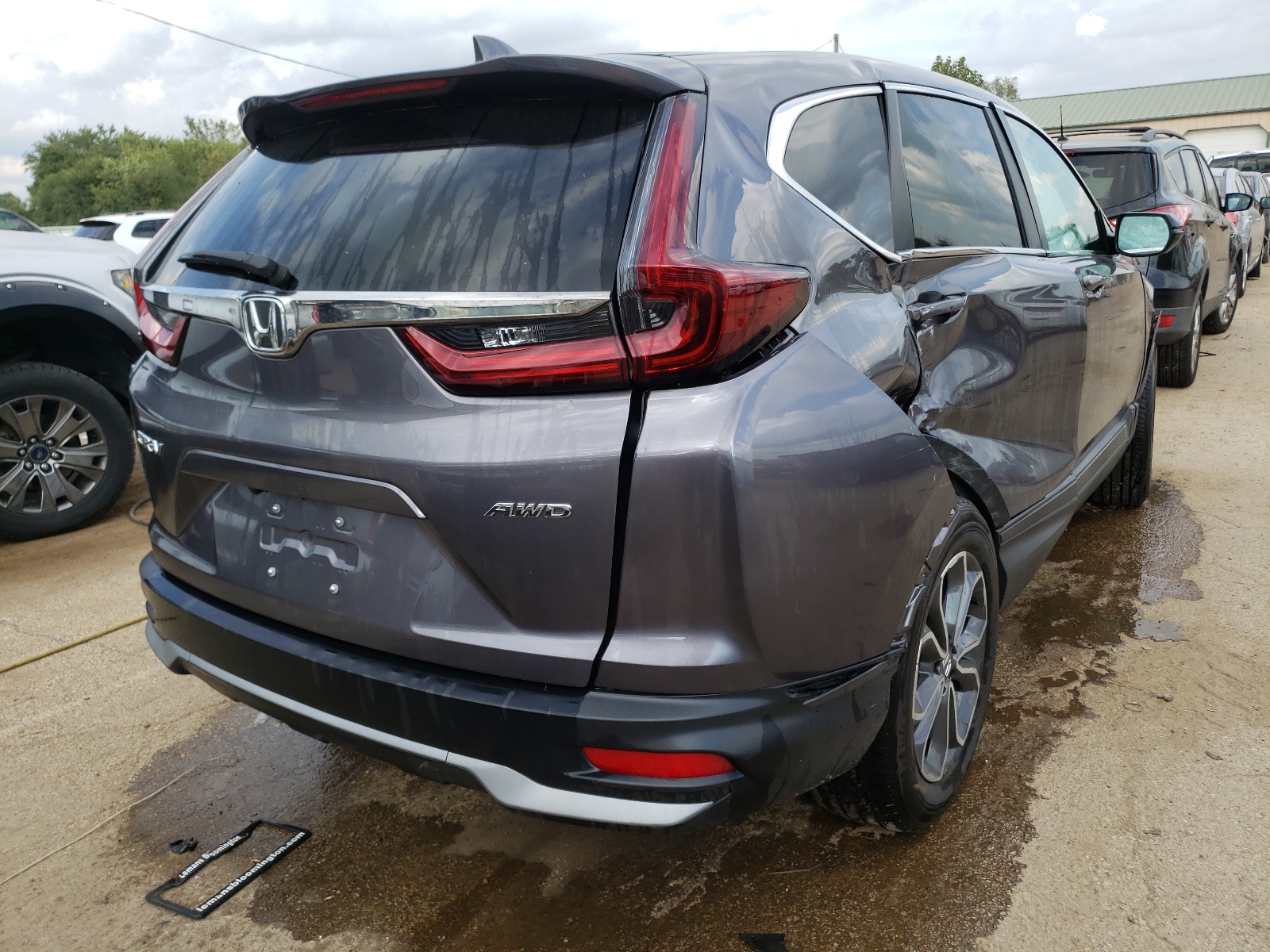 Photo 4 from auction – 2021 HONDA CR-V EX with VIN 7FARW2H50ME019970