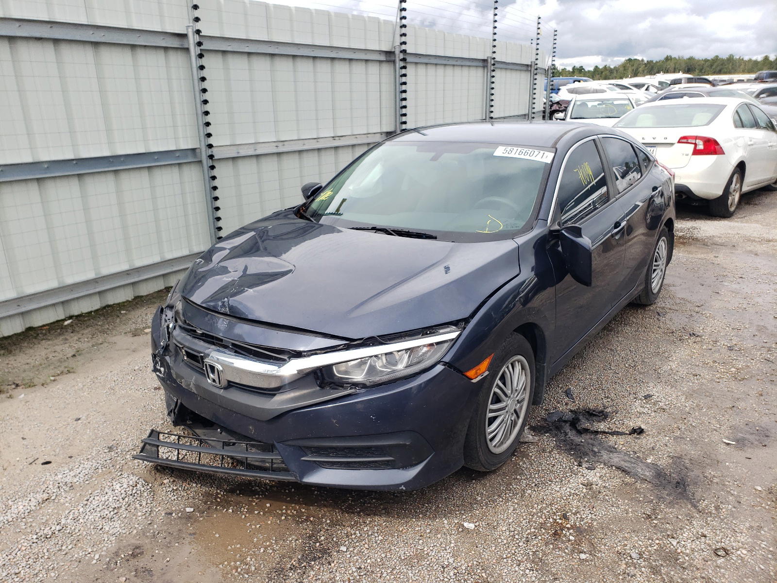 Photo 2 from auction – 2017 HONDA CIVIC LX with VIN 19XFC2F58HE048834