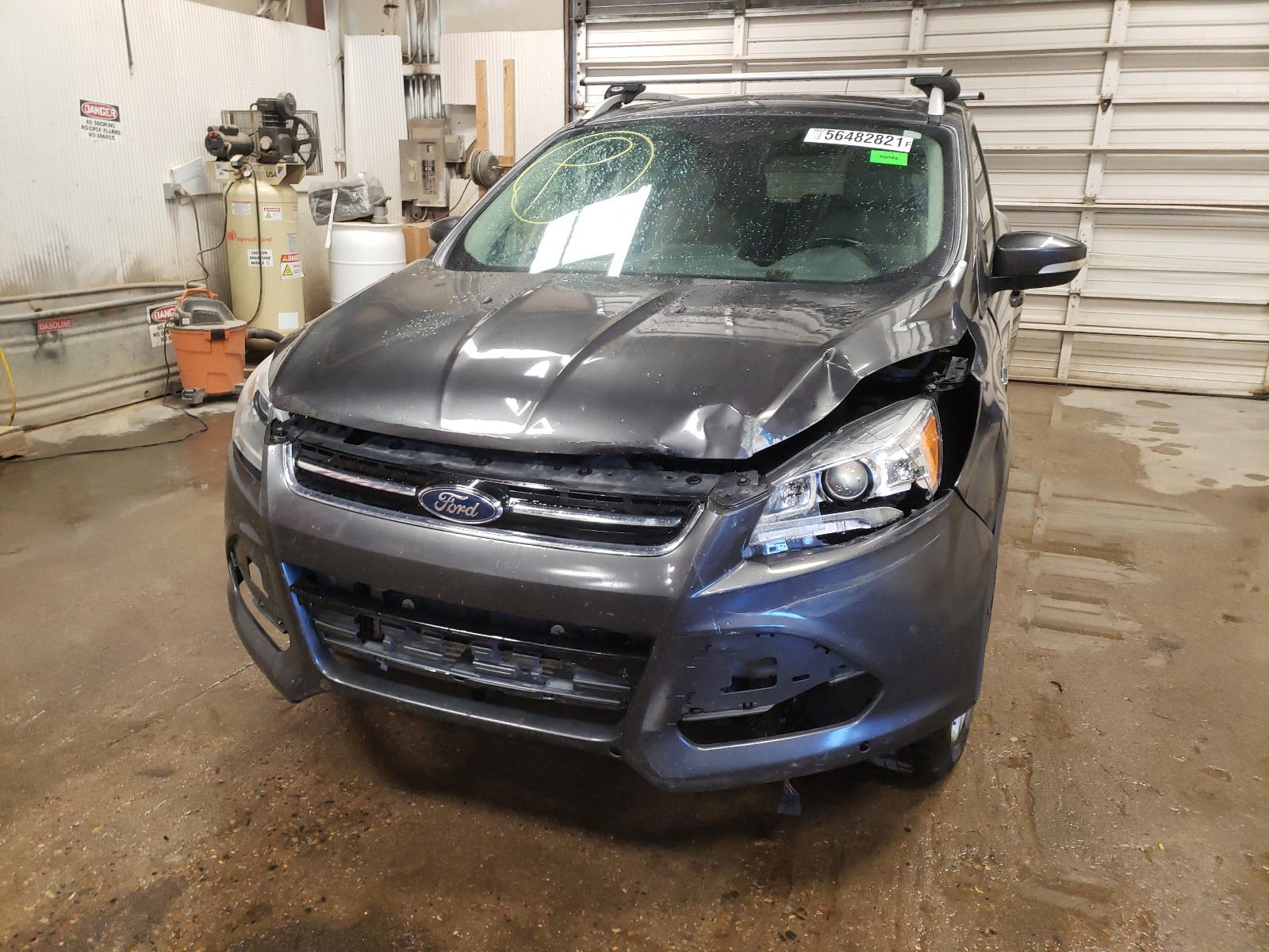 Photo 9 from auction – 2015 FORD ESCAPE TIT with VIN 1FMCU9J95FUB32140