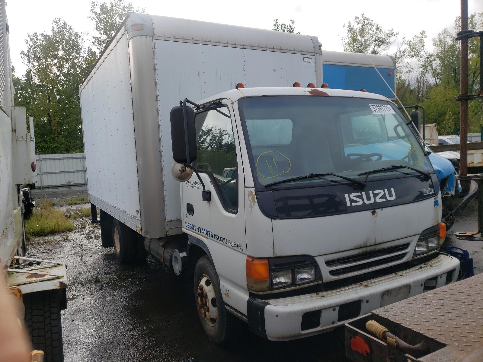ISUZU NPR 2001 with VIN JALB4B14817011023 - Photo from auction