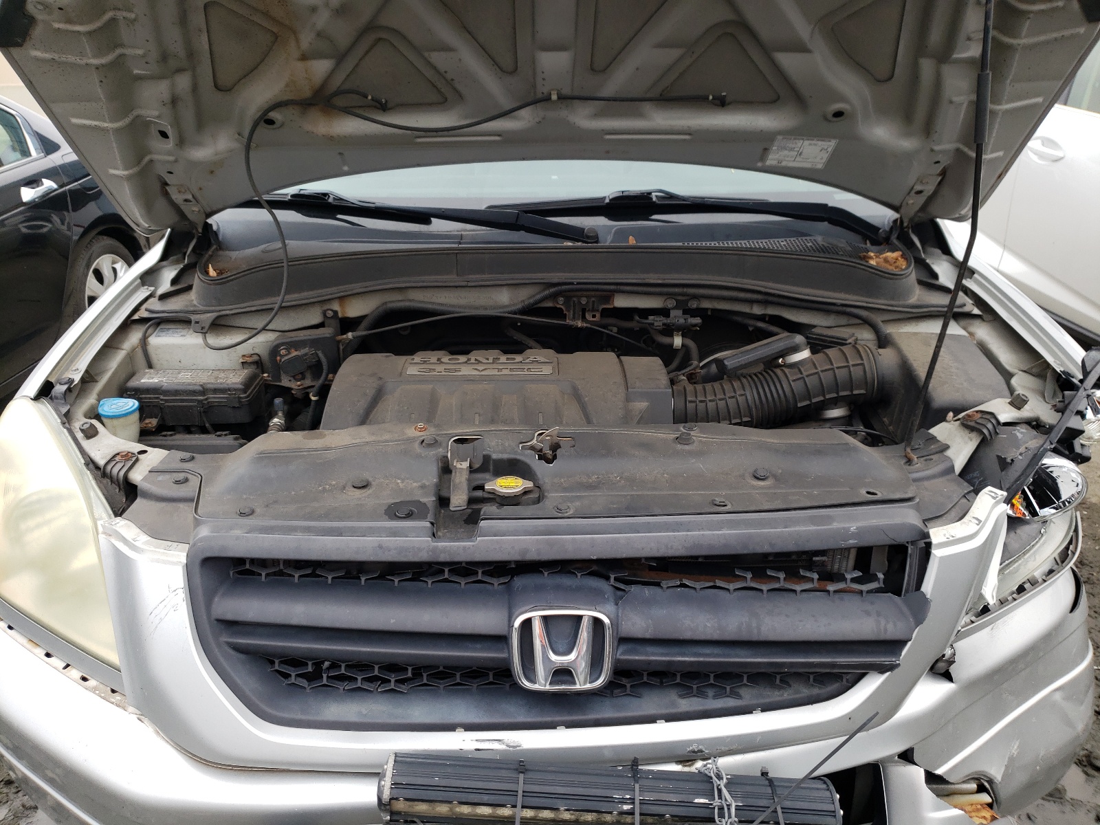 Photo 7 from auction – 2005 HONDA PILOT EX with VIN 2HKYF18425H506308