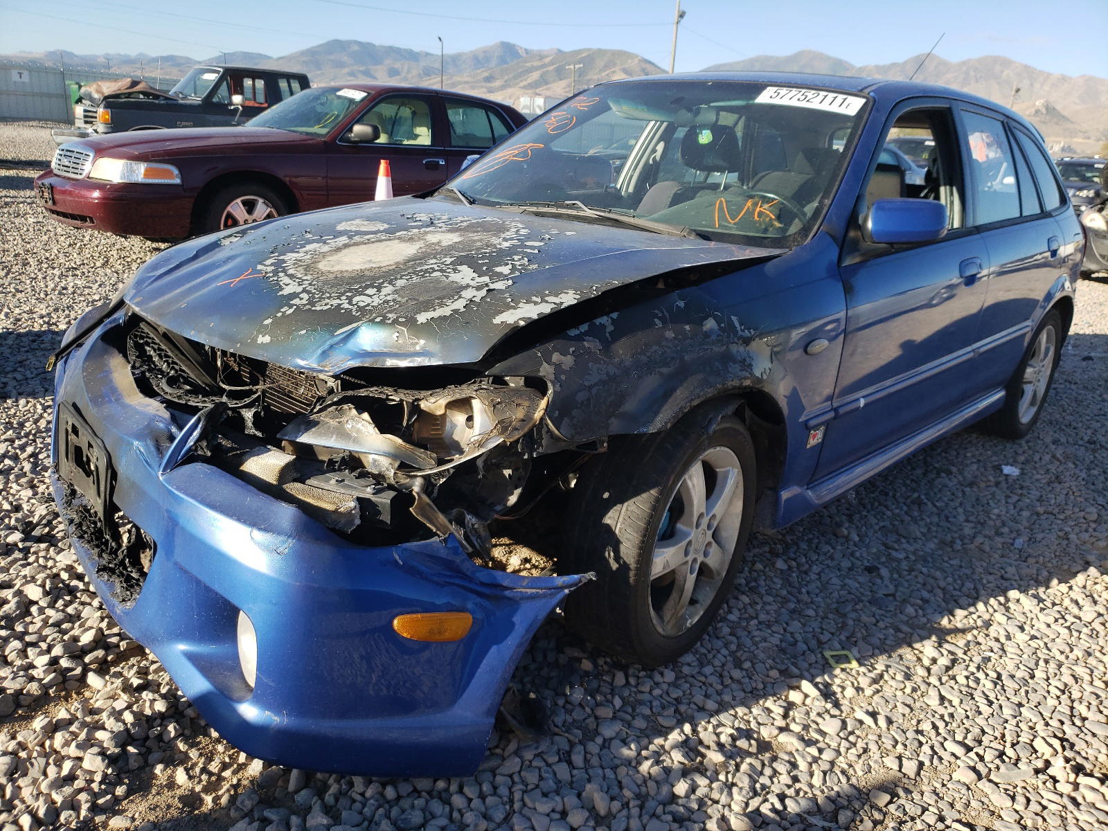 Photo 2 from auction – 2003 MAZDA PROTEGE with VIN JM1BJ245931185090