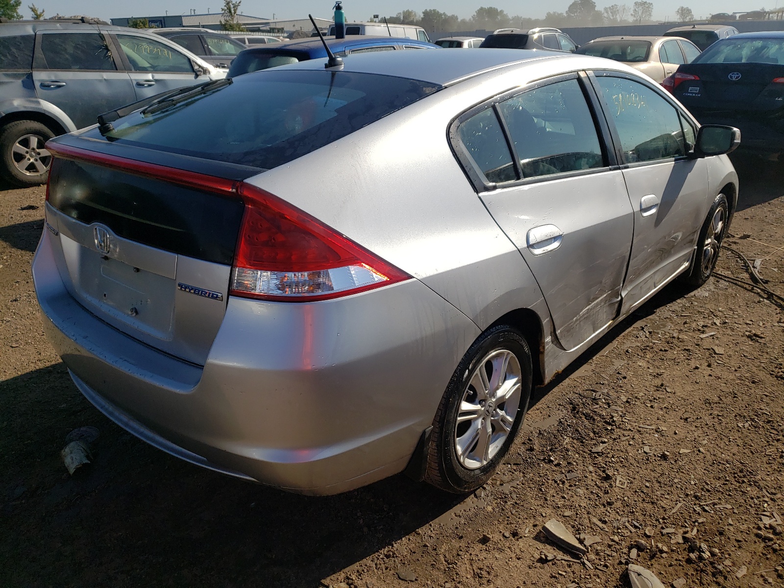 Photo 4 from auction – 2010 HONDA INSIGHT EX with VIN JHMZE2H70AS001790