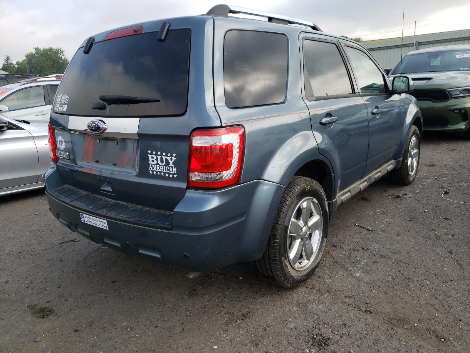 Photo 4 from auction – 2012 FORD ESCAPE LIM with VIN 1FMCU9EG9CKB48213