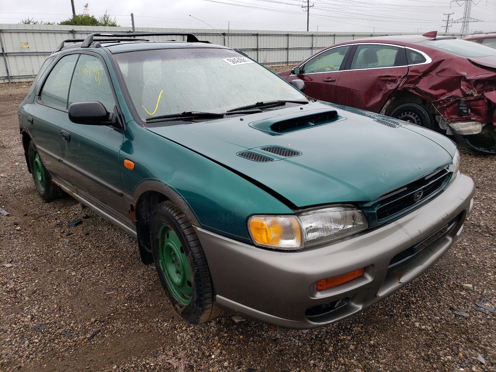 SUBARU IMPREZA OU 1997 with VIN JF1GF4855VG819708 - Photo from auction