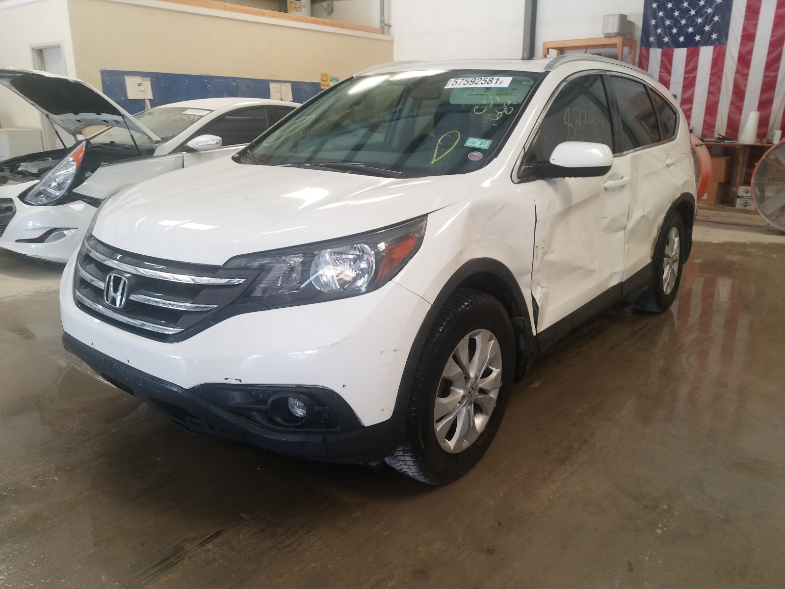 Photo 2 from auction – 2013 HONDA CR-V EXL with VIN 5J6RM3H79DL033687