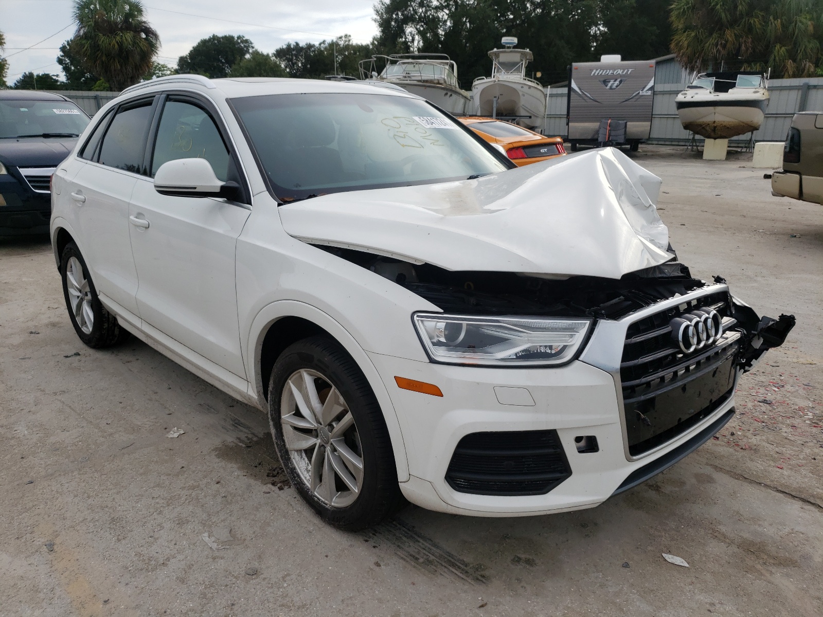 AUDI Q3 PREMIUM 2017 with VIN WA1HCCFSXHR005812 - Photo from auction