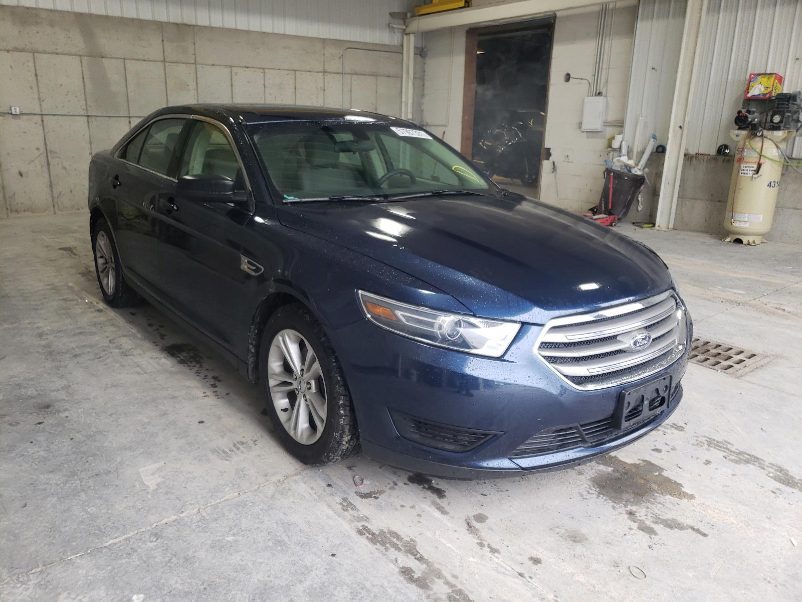 FORD TAURUS SE 2016 with VIN 1FAHP2D8XGG155138 - Photo from auction