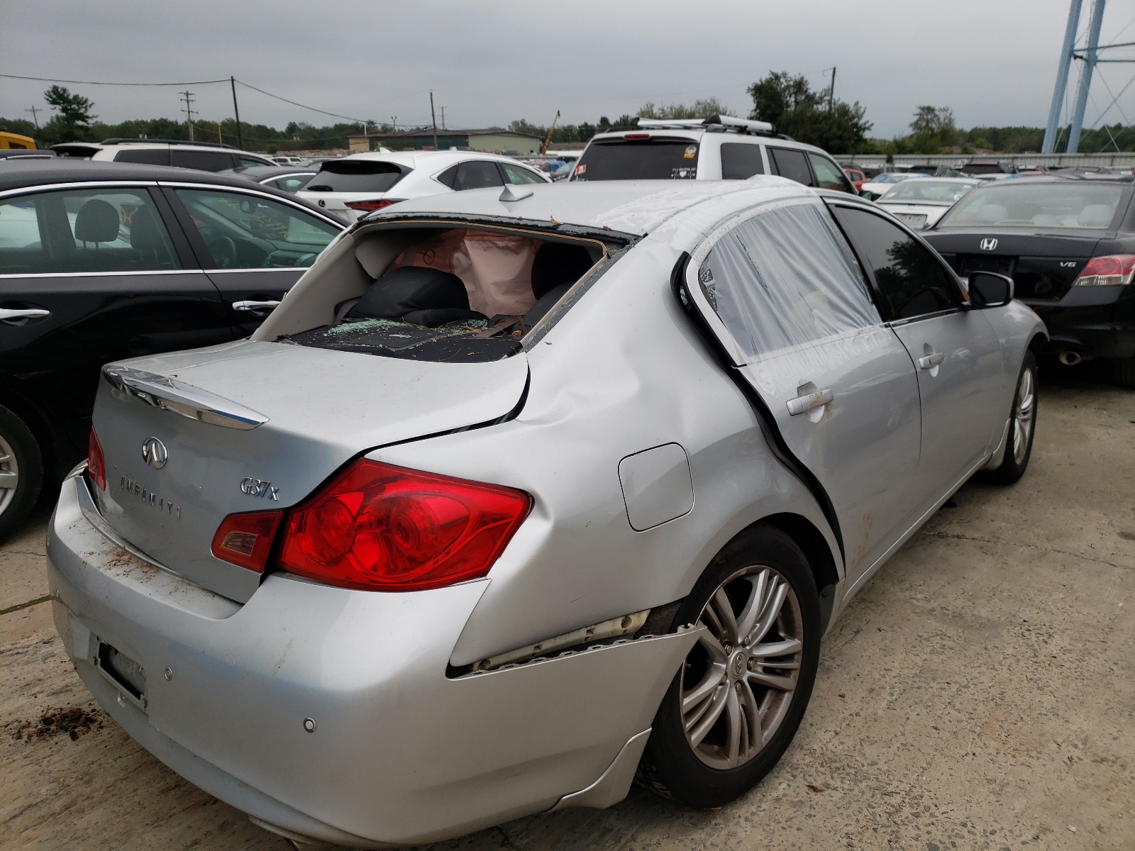 Photo 4 from auction – 2011 INFINITI G37 with VIN JN1CV6AR0BM353805