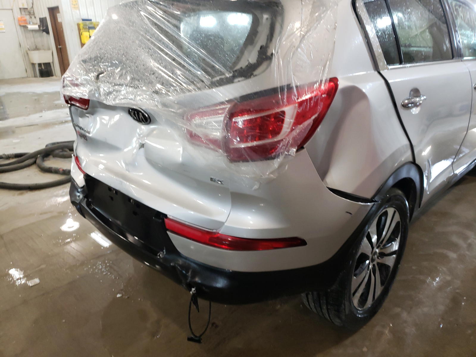 Photo 9 from auction – 2011 KIA SPORTAGE E with VIN KNDPCCA2XB7066587