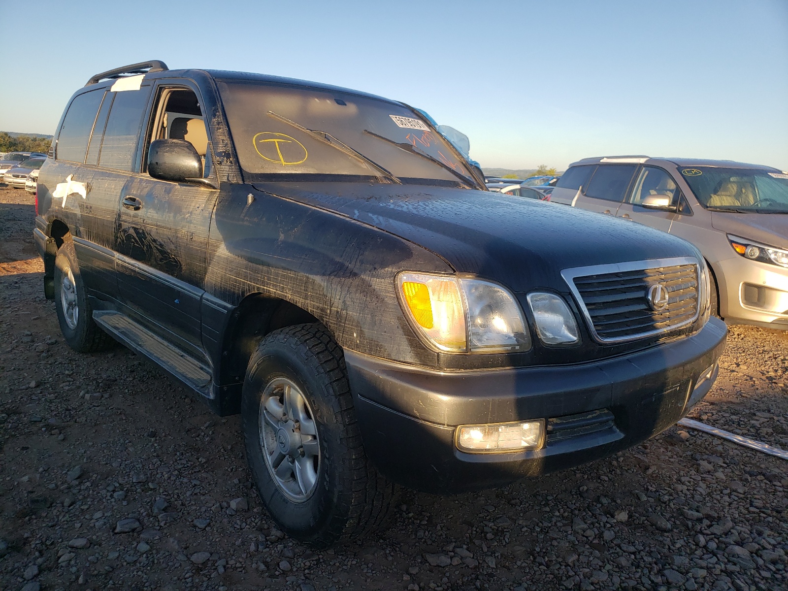 LEXUS LX 470 1999 with VIN JT6HT00W4X0070990 - Photo from auction