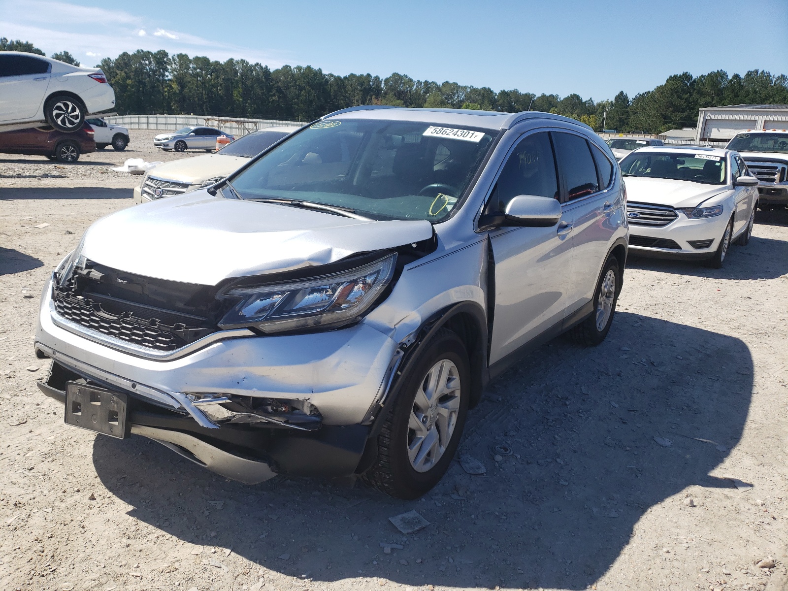 Photo 2 from auction – 2016 HONDA CR-V EXL with VIN 2HKRM3H77GH500216
