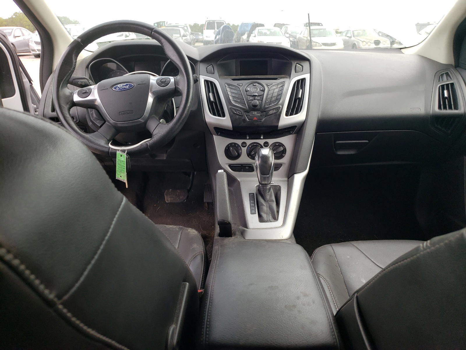 Photo 9 from auction – 2014 FORD FOCUS SE with VIN 1FADP3K21EL337799