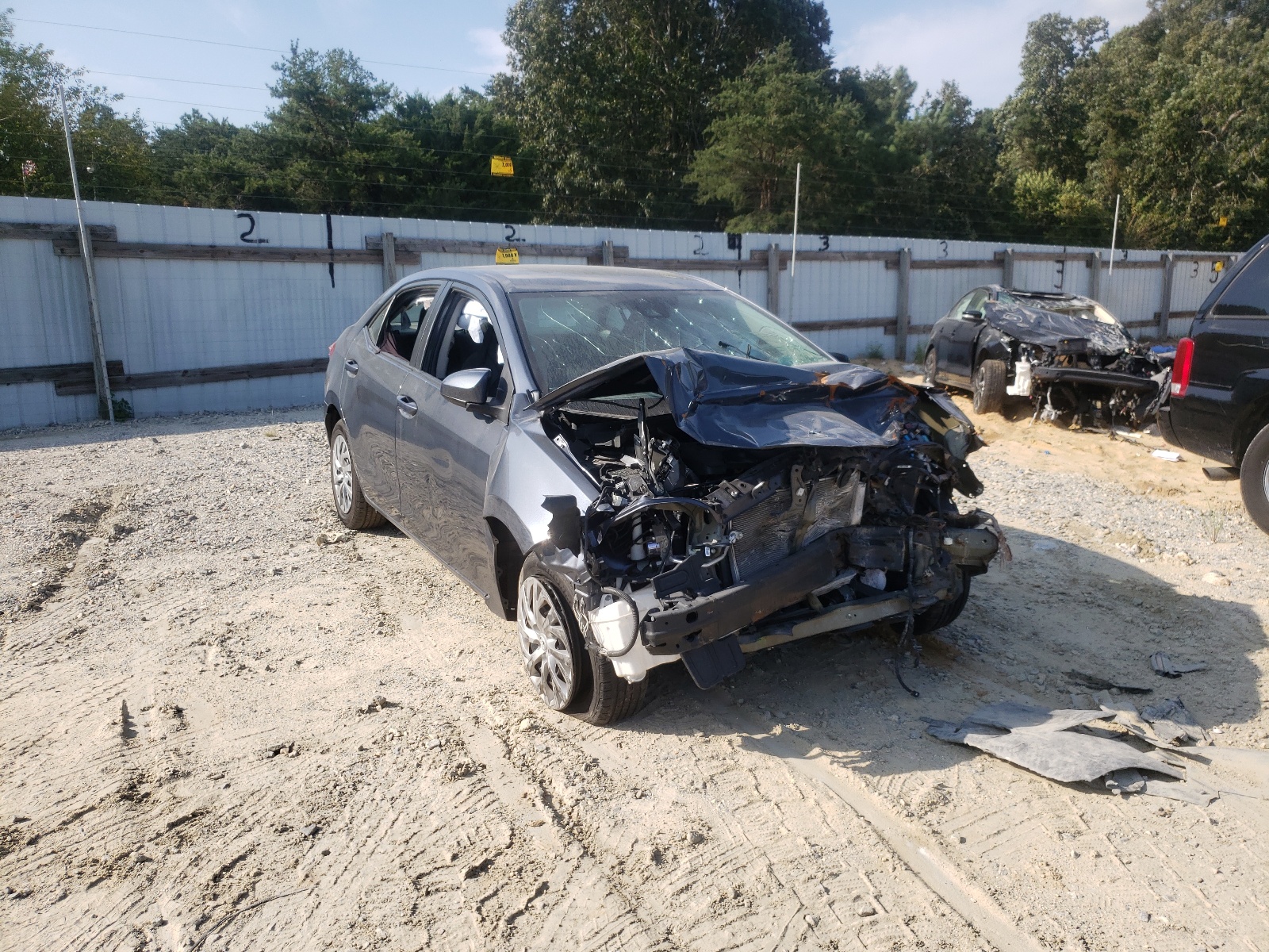 TOYOTA COROLLA L 2018 with VIN 5YFBURHE8JP804040 - Photo from auction