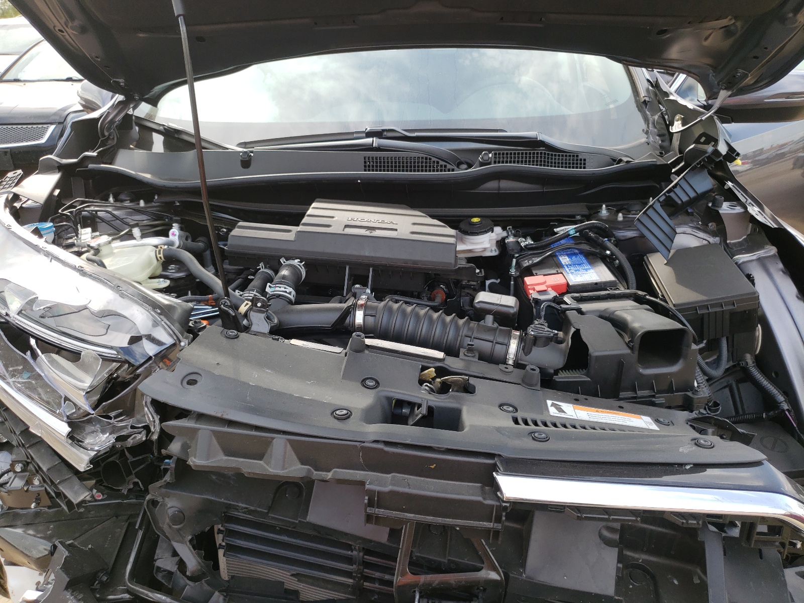 Photo 7 from auction – 2021 HONDA CR-V EX with VIN 7FARW2H50ME019970