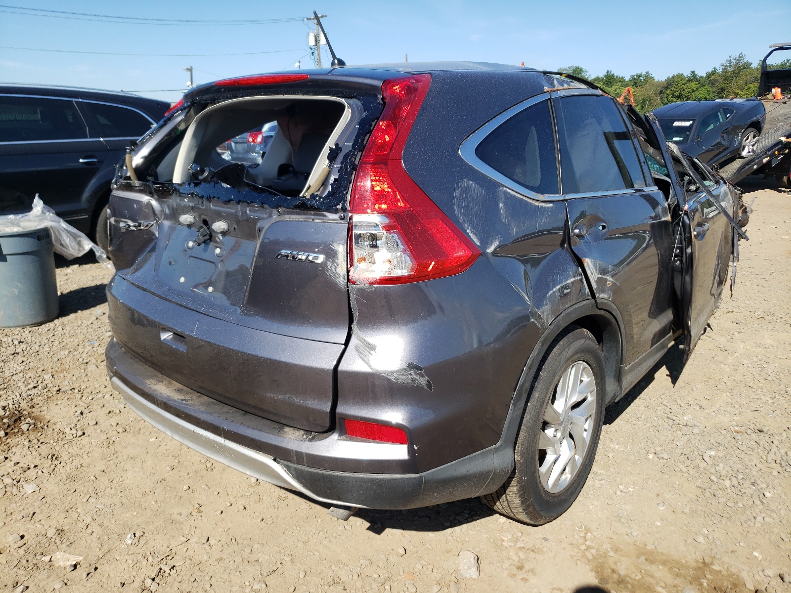 Photo 4 from auction – 2016 HONDA CR-V EX with VIN 2HKRM4H58GH728004
