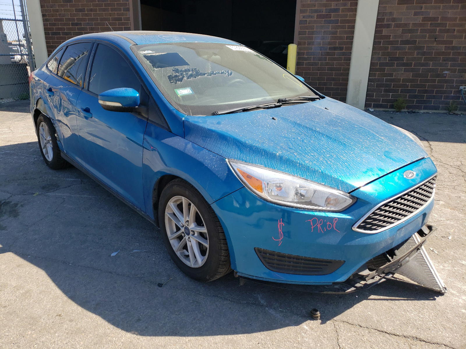 FORD FOCUS SE 2015 with VIN 1FADP3F29FL262653 - Photo from auction