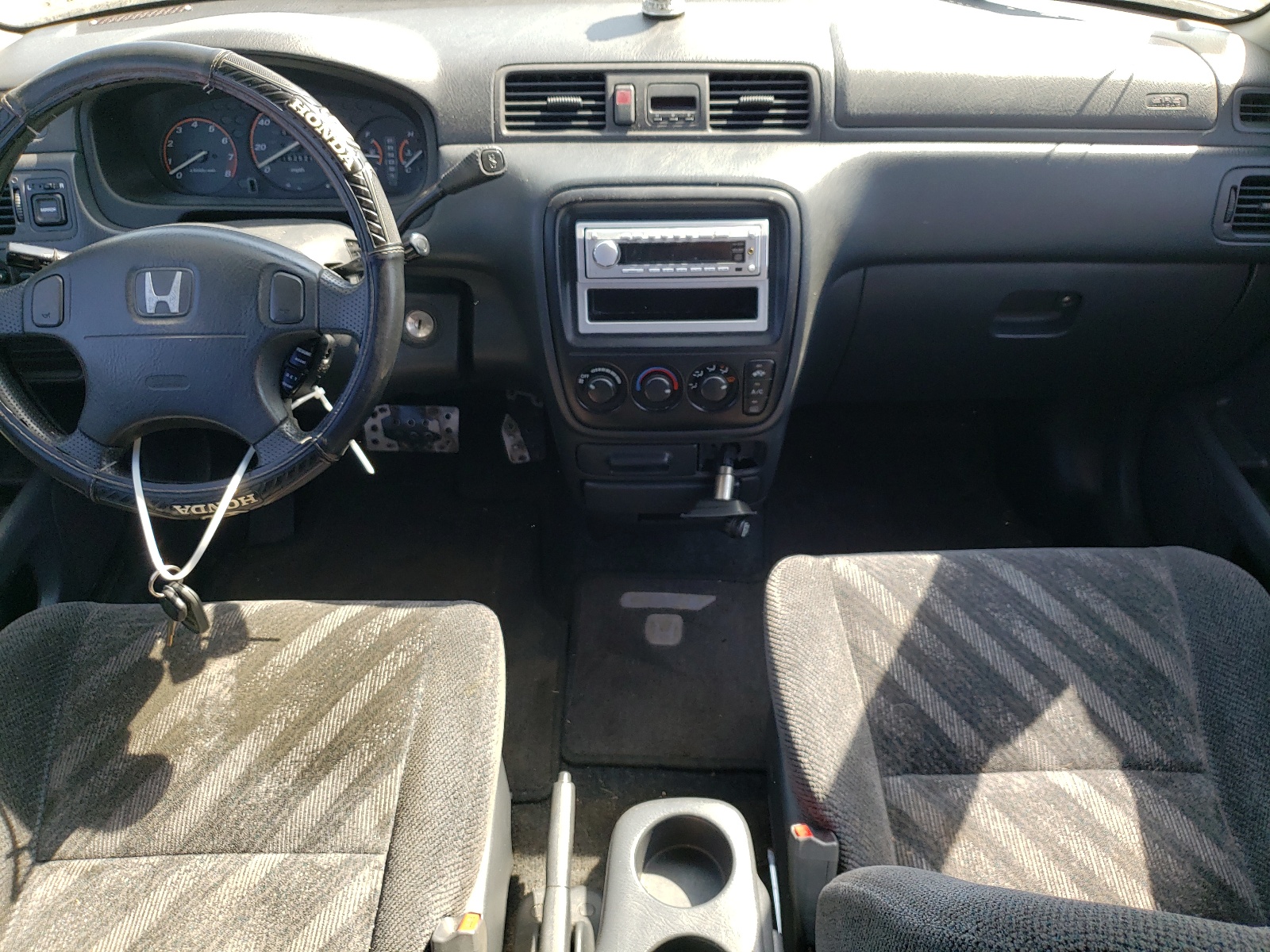 Photo 9 from auction – 1999 HONDA CR-V with VIN JHLRD1868XC084915