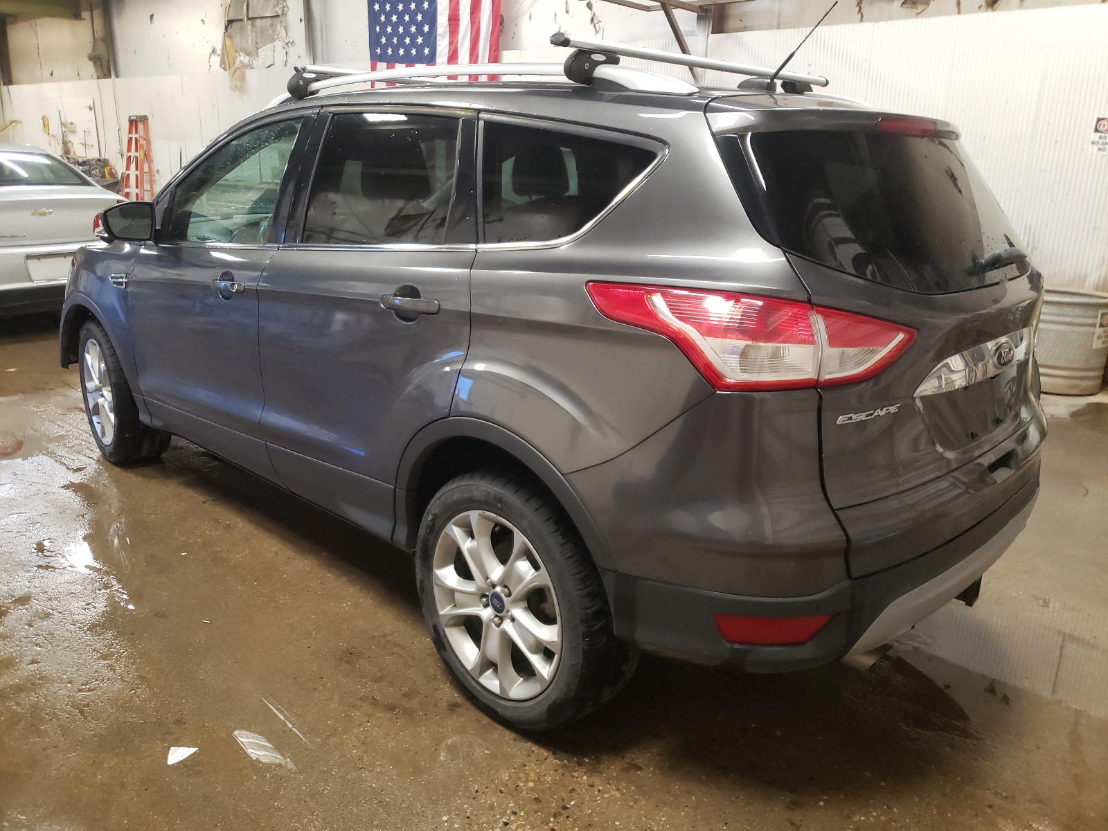 Photo 3 from auction – 2015 FORD ESCAPE TIT with VIN 1FMCU9J95FUB32140