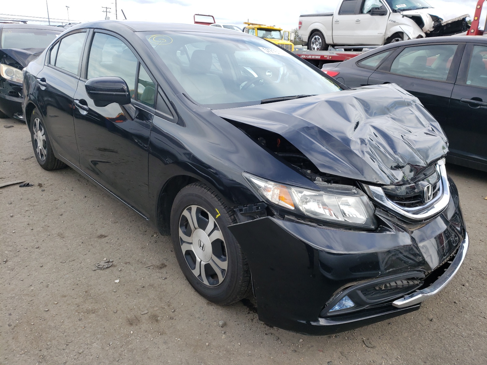 HONDA CIVIC HYBR 2015 with VIN 19XFB4F3XFE201336 - Photo from auction