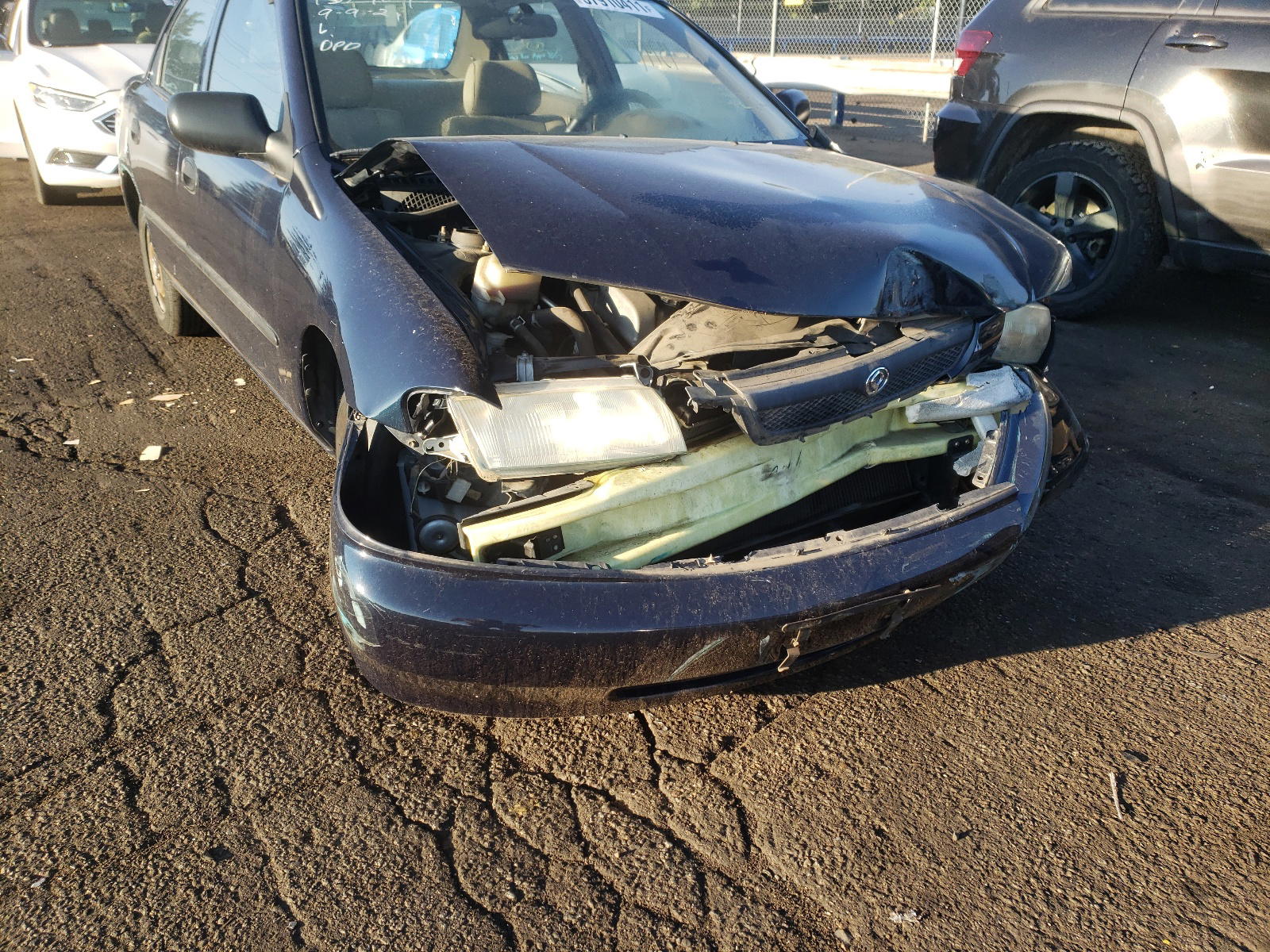 Photo 9 from auction – 1997 MAZDA PROTEGE DX with VIN JM1BC1419V0133775