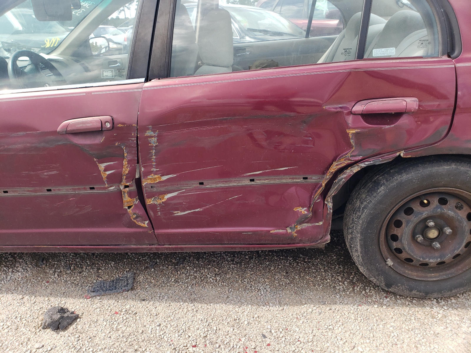 Photo 9 from auction – 2002 HONDA CIVIC LX with VIN 1HGES16542L063579