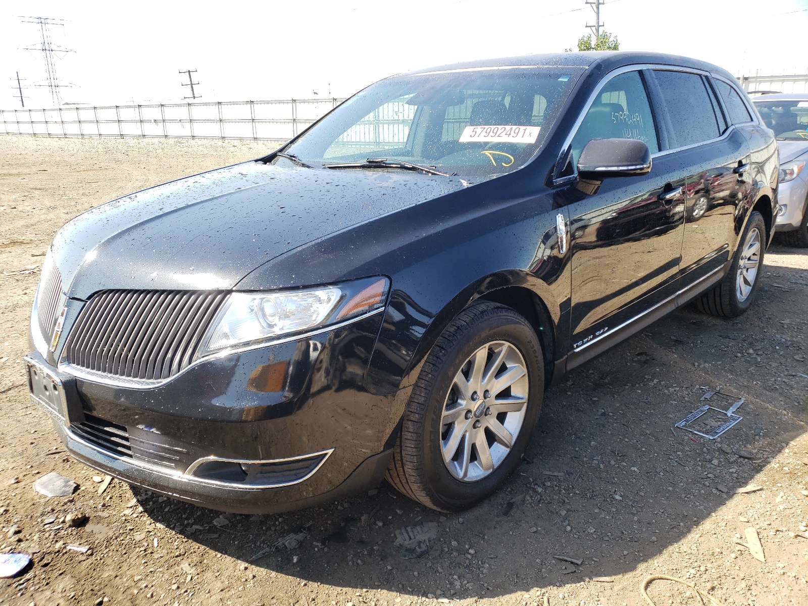 Photo 2 from auction – 2015 LINCOLN MKT with VIN 2LMHJ5NK8FBL04160