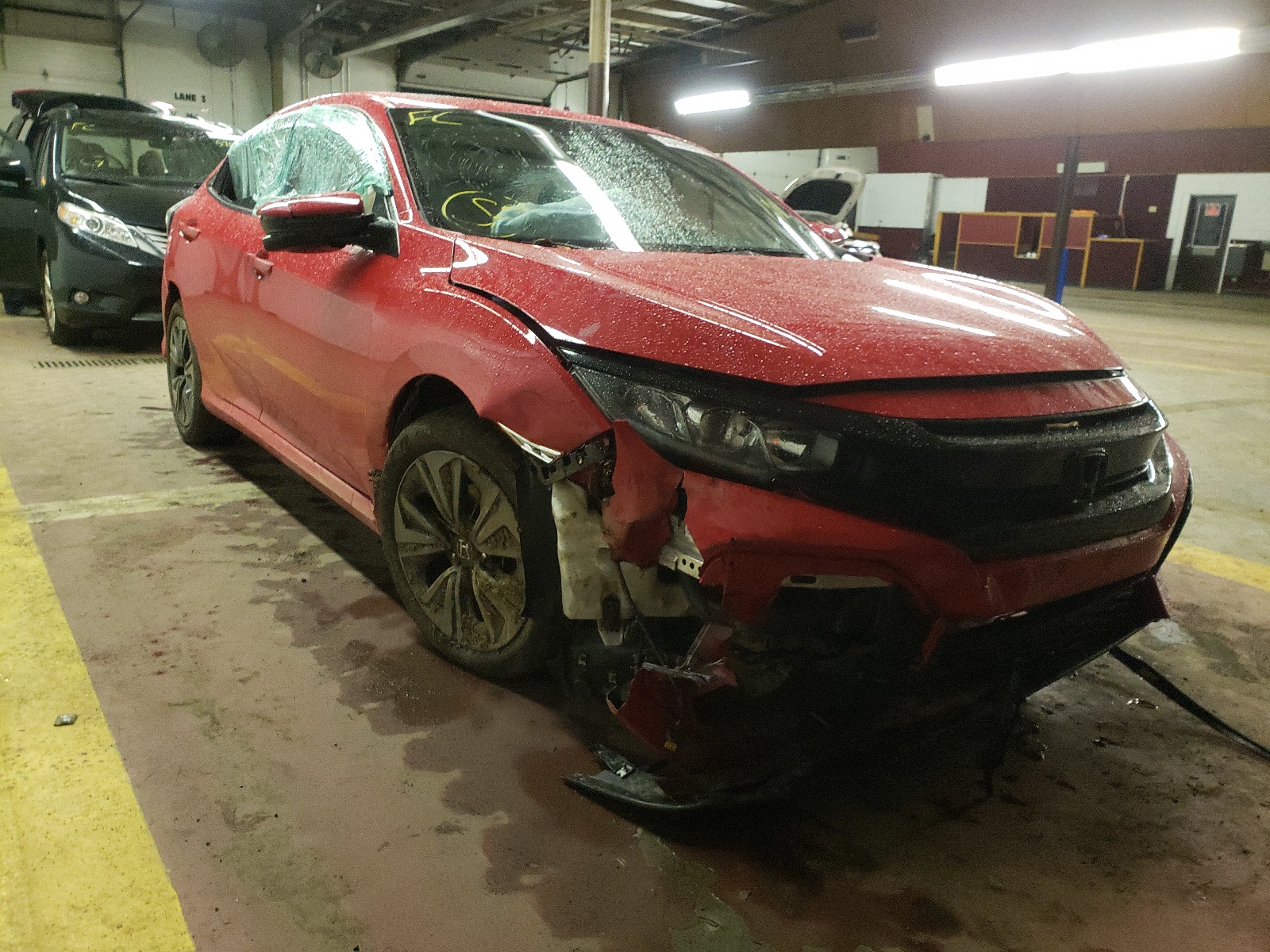 HONDA CIVIC EX 2018 with VIN SHHFK7H50JU410098 - Photo from auction