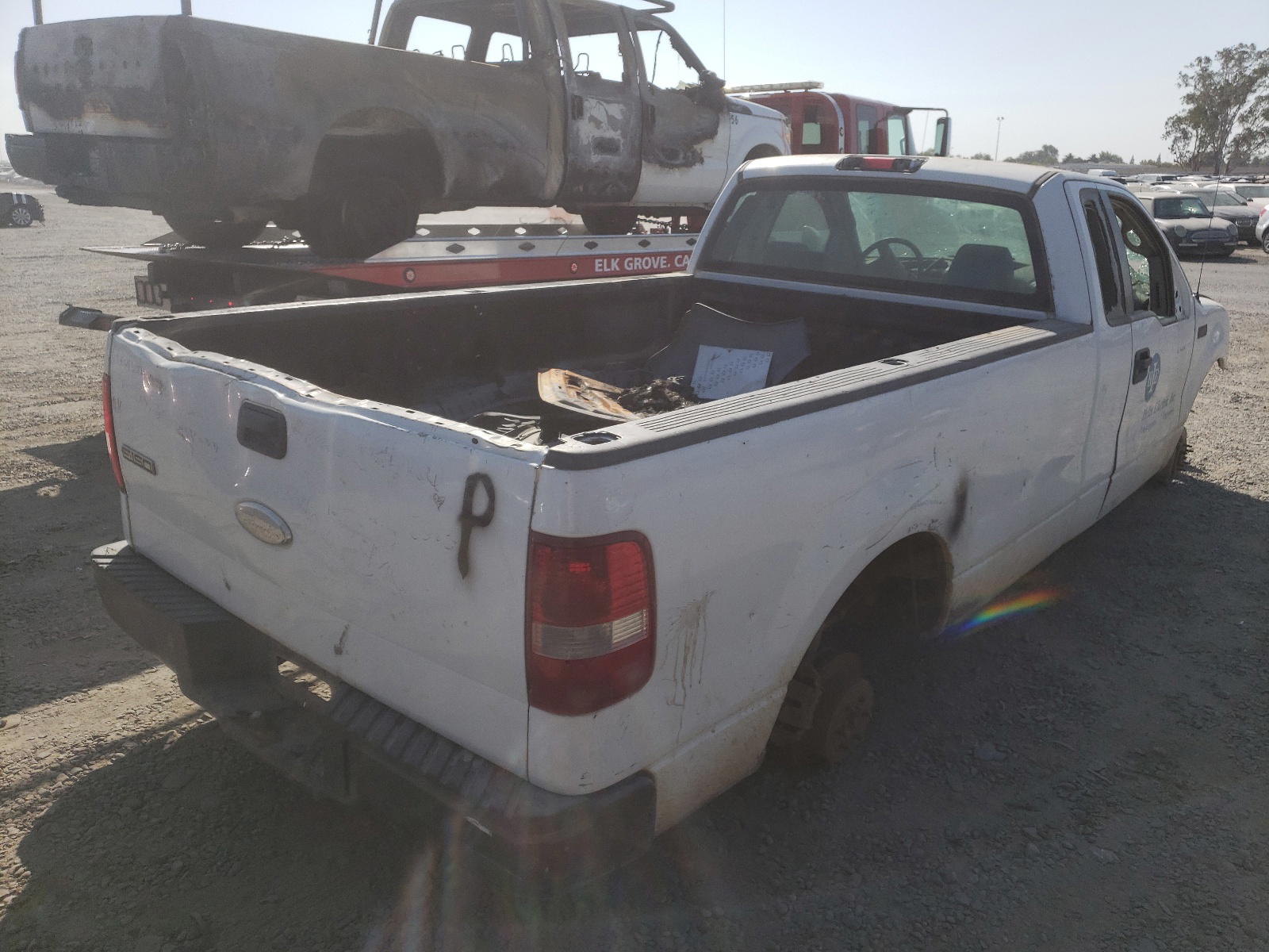 Photo 4 from auction – 2006 FORD F150 with VIN 1FTRF12296NA93803