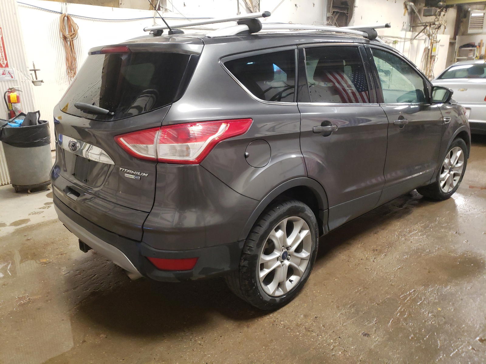 Photo 4 from auction – 2015 FORD ESCAPE TIT with VIN 1FMCU9J95FUB32140