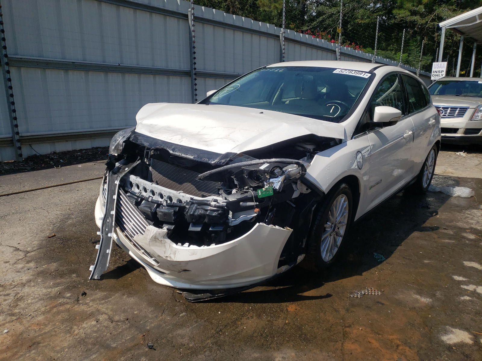 Photo 2 from auction – 2014 FORD FOCUS BEV with VIN 1FADP3R4XEL353300