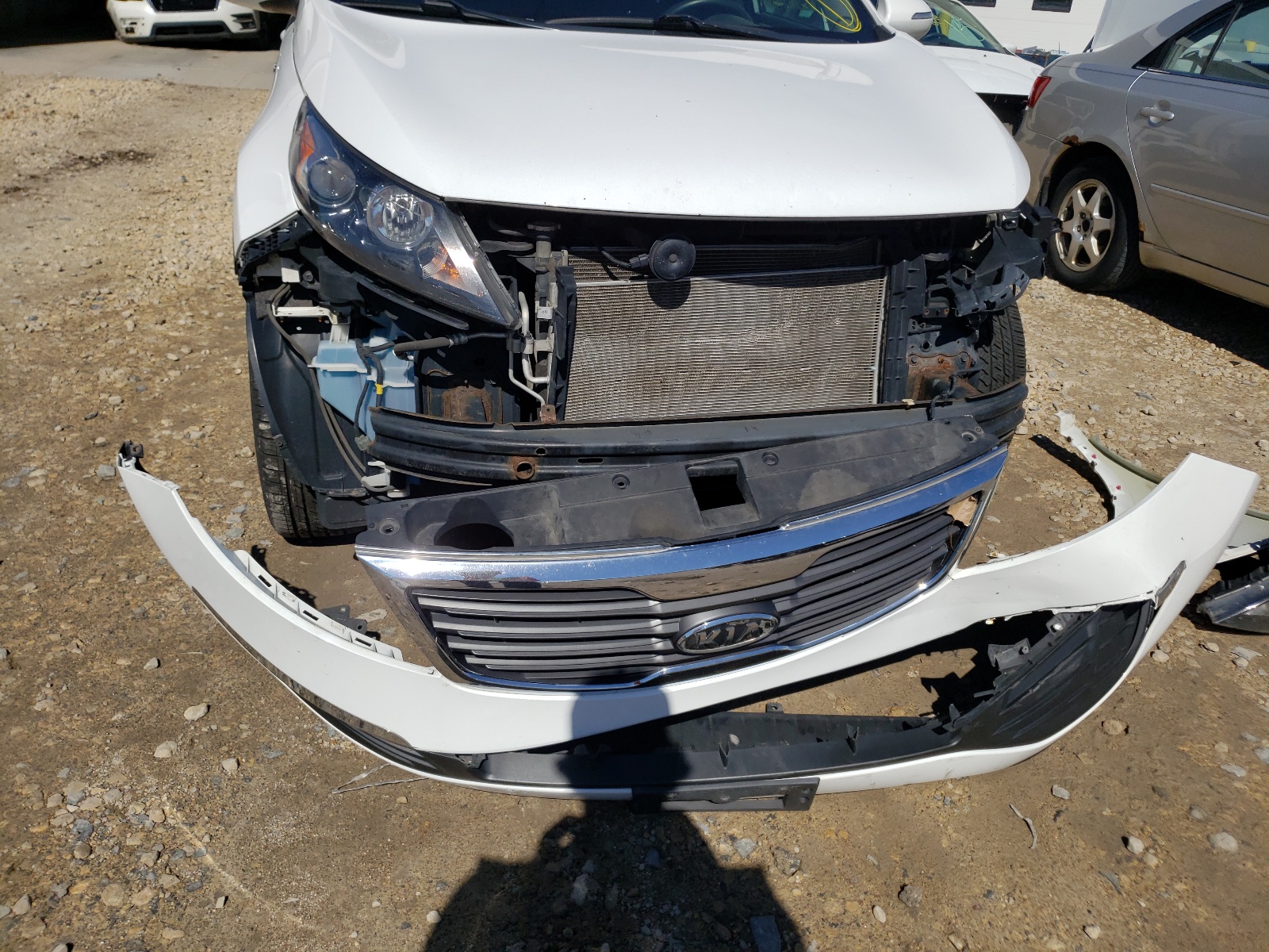 Photo 9 from auction – 2011 KIA SPORTAGE L with VIN KNDPBCA25B7079363