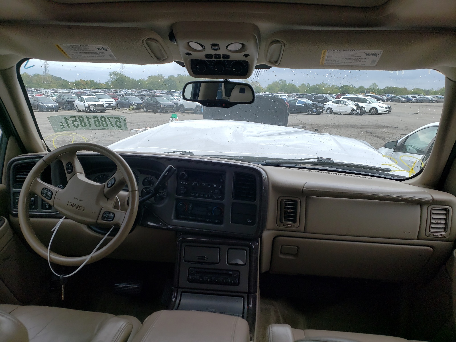 Photo 9 from auction – 2004 GMC YUKON DENA with VIN 1GKEK63U74J209029