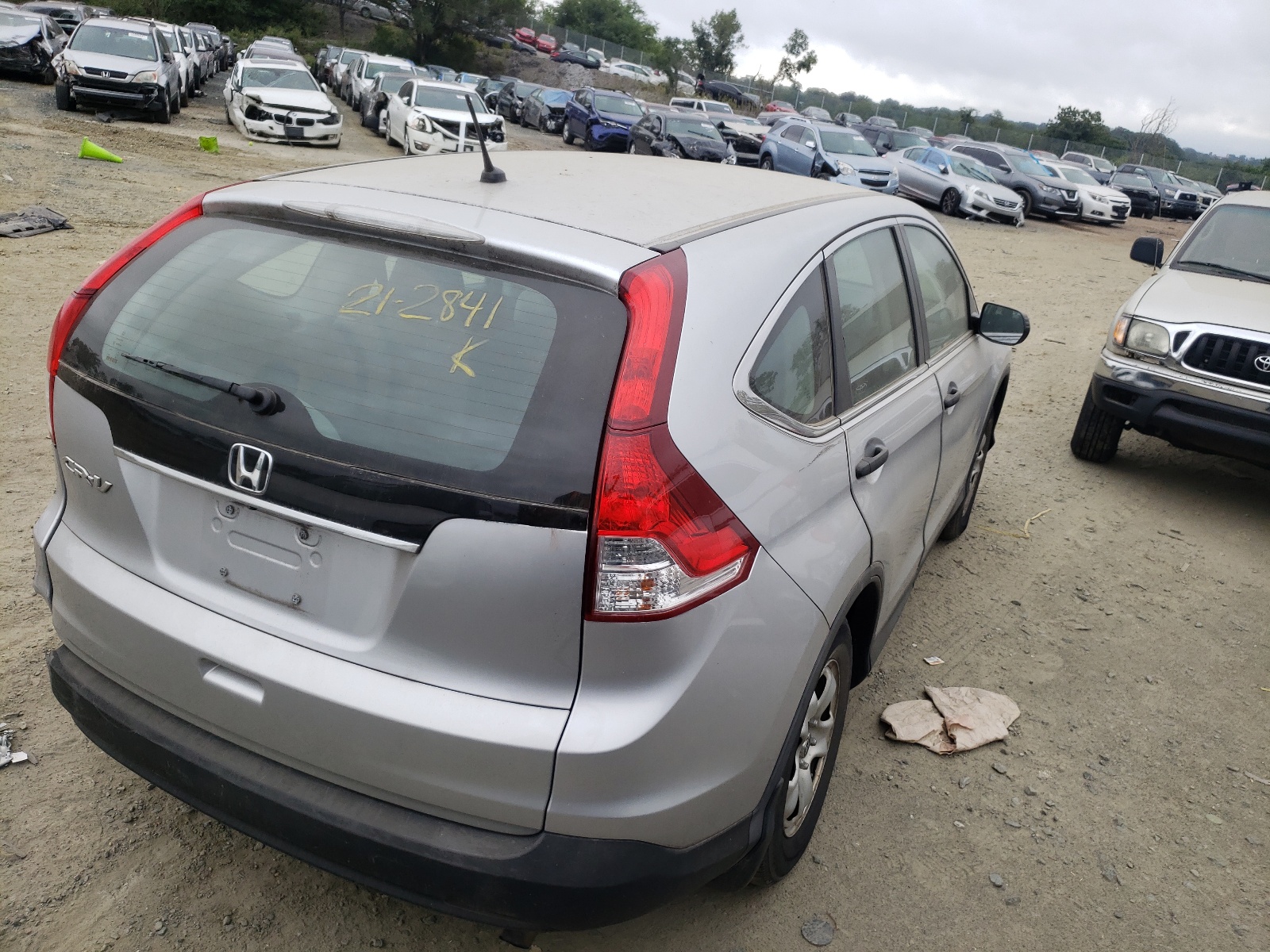 Photo 4 from auction – 2014 HONDA CR-V LX with VIN 2HKRM3H39EH521532