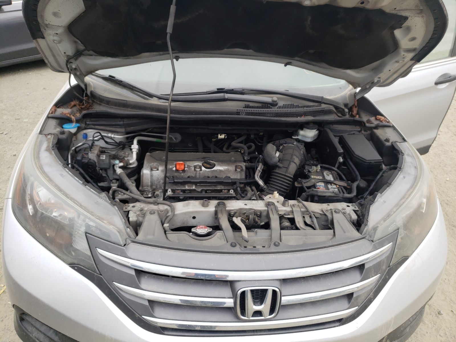 Photo 7 from auction – 2014 HONDA CR-V LX with VIN 2HKRM3H39EH521532