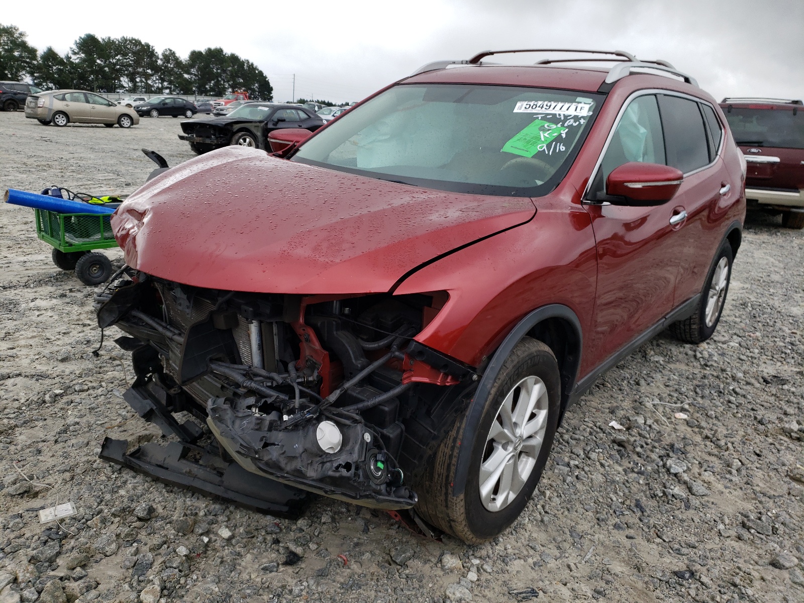 Photo 2 from auction – 2014 NISSAN ROGUE S with VIN 5N1AT2MT3EC847317
