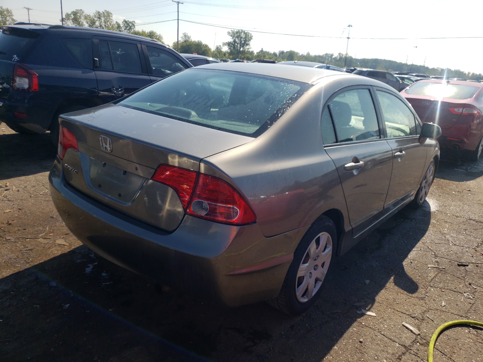 Photo 4 from auction – 2007 HONDA CIVIC LX with VIN 1HGFA16557L110438