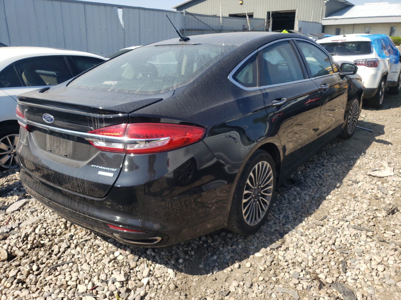 Photo 4 from auction – 2017 FORD FUSION TIT with VIN 3FA6P0K99HR111486