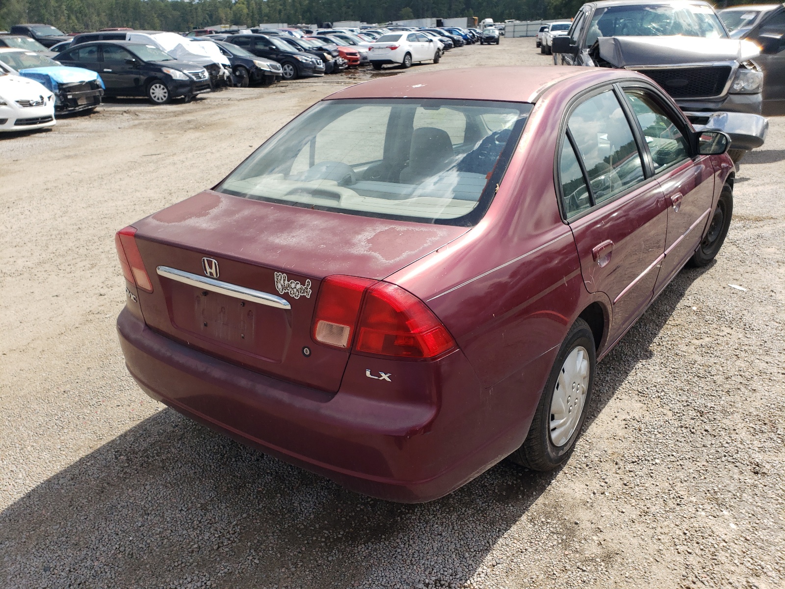 Photo 4 from auction – 2002 HONDA CIVIC LX with VIN 1HGES16542L063579
