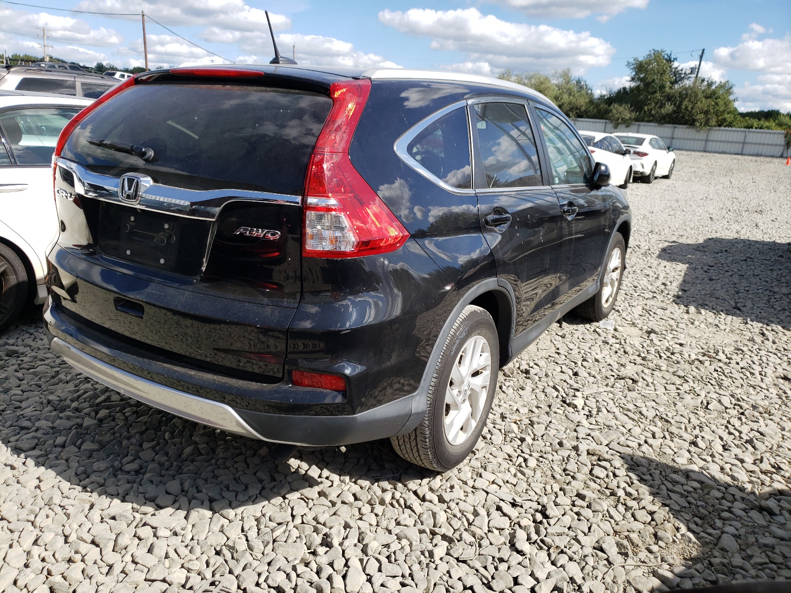 Photo 4 from auction – 2016 HONDA CR-V EXL with VIN 2HKRM4H71GH684414