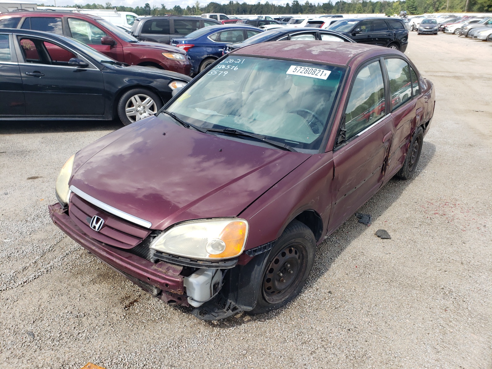 Photo 2 from auction – 2002 HONDA CIVIC LX with VIN 1HGES16542L063579