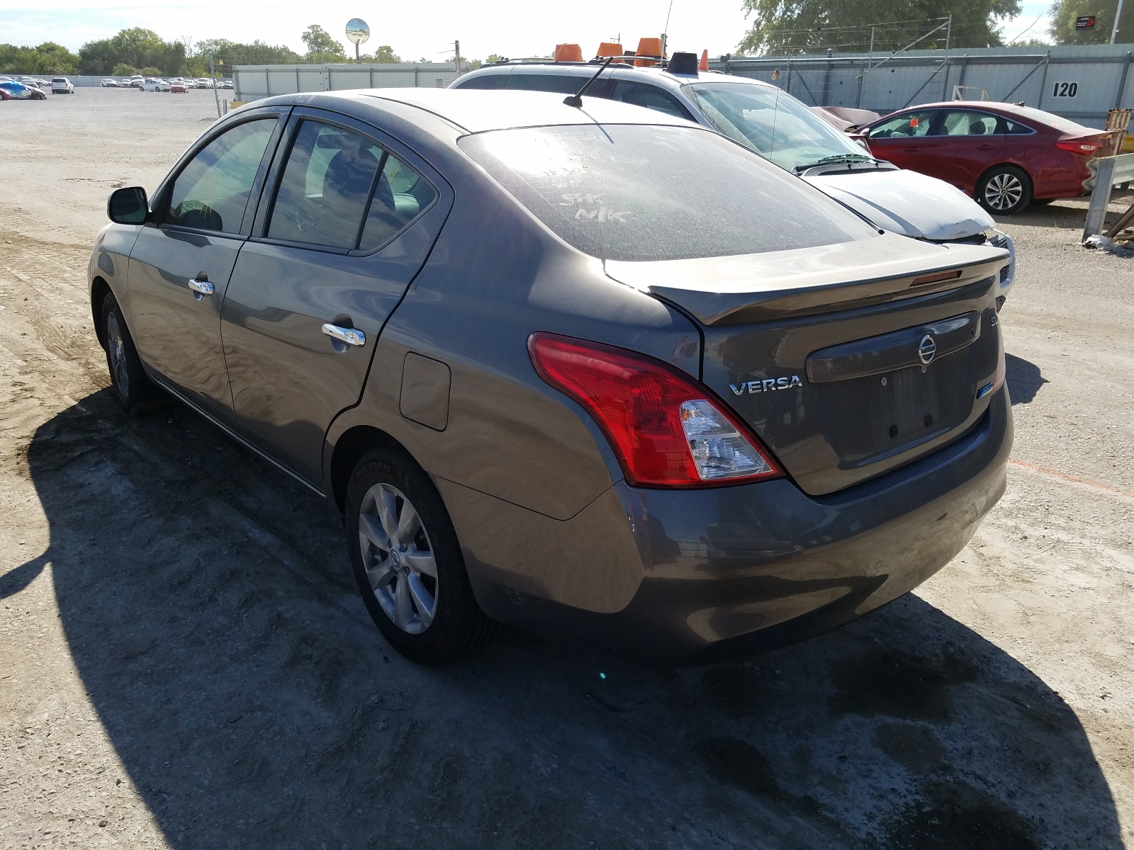 Photo 3 from auction – 2014 NISSAN VERSA S with VIN 3N1CN7AP4EL810070