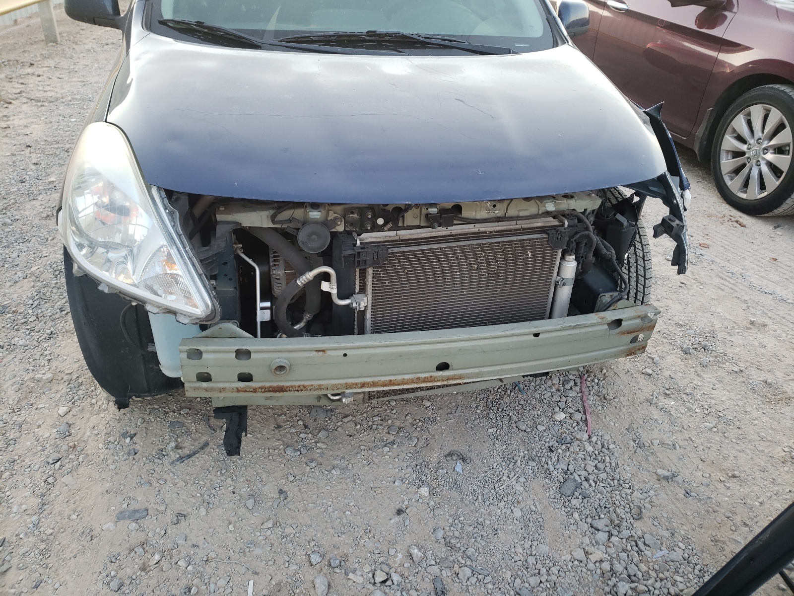 Photo 9 from auction – 2014 NISSAN VERSA S with VIN 3N1CN7AP9EL844344