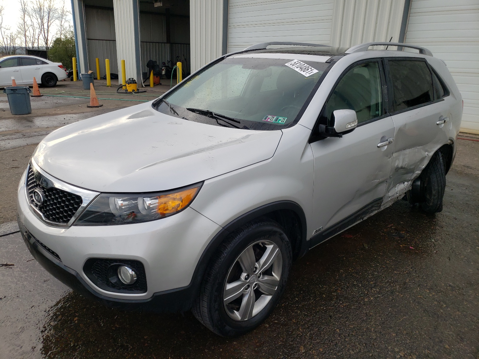 Photo 2 from auction – 2013 KIA SORENTO EX with VIN 5XYKUDA28DG396876